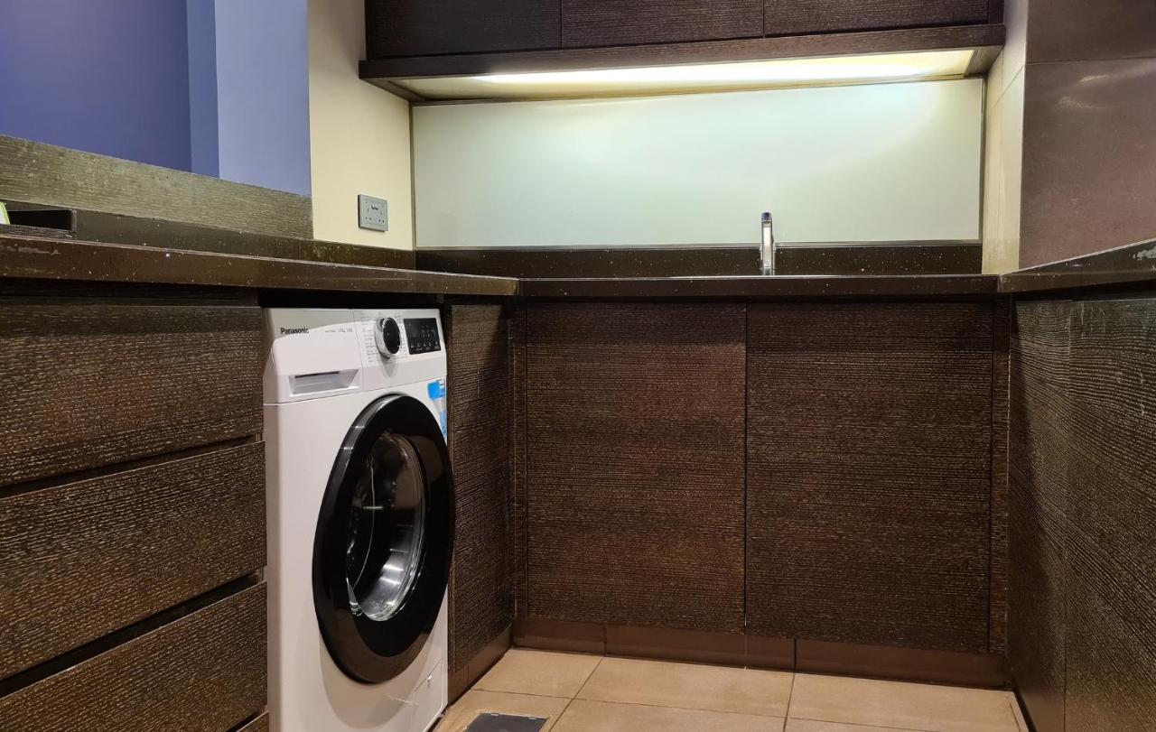 Four Points By Sheraton Аль-Айн Екстер'єр фото A laundry room